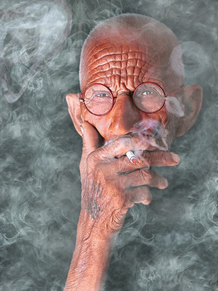 Old Man Smoking by Sayyed Nayyer Reza — canvas wall art