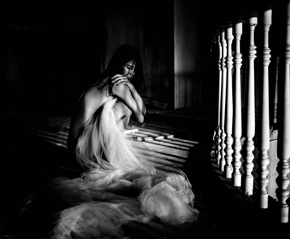 Sitting Woman in Shadows by Thanakorn Chai Telan — canvas wall art