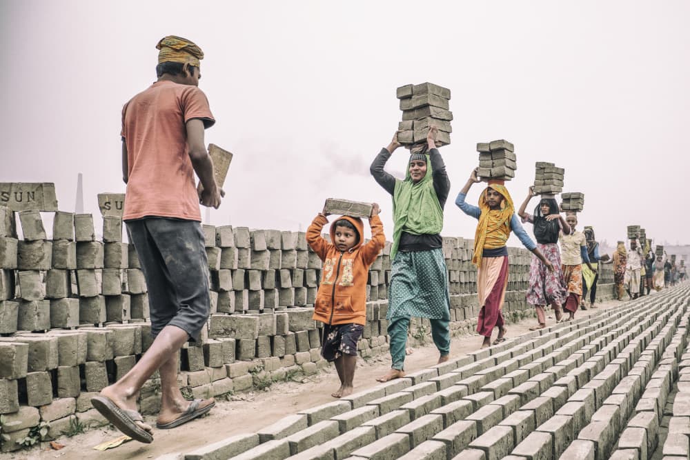 Child Carrying Bricks by Marcel Rebro — canvas wall art
