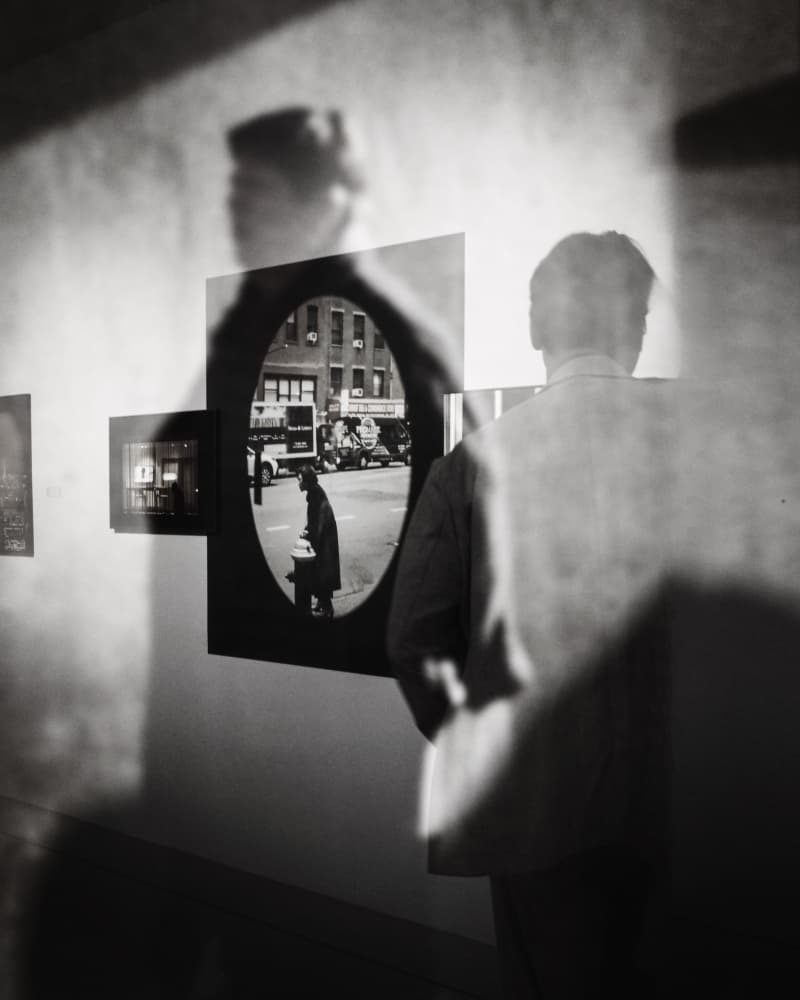 Man Views Street Reflection by Wanjae Choi — canvas wall art