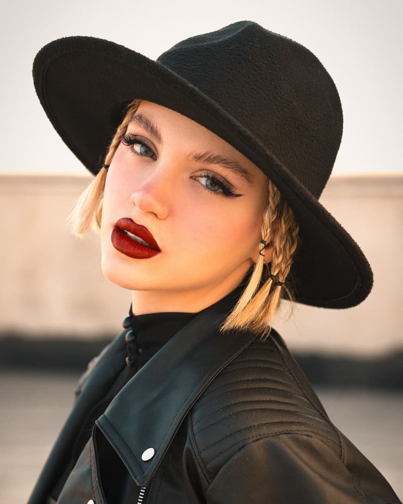 Edgy Woman Black Hat by Behrouz Sasani — canvas wall art
