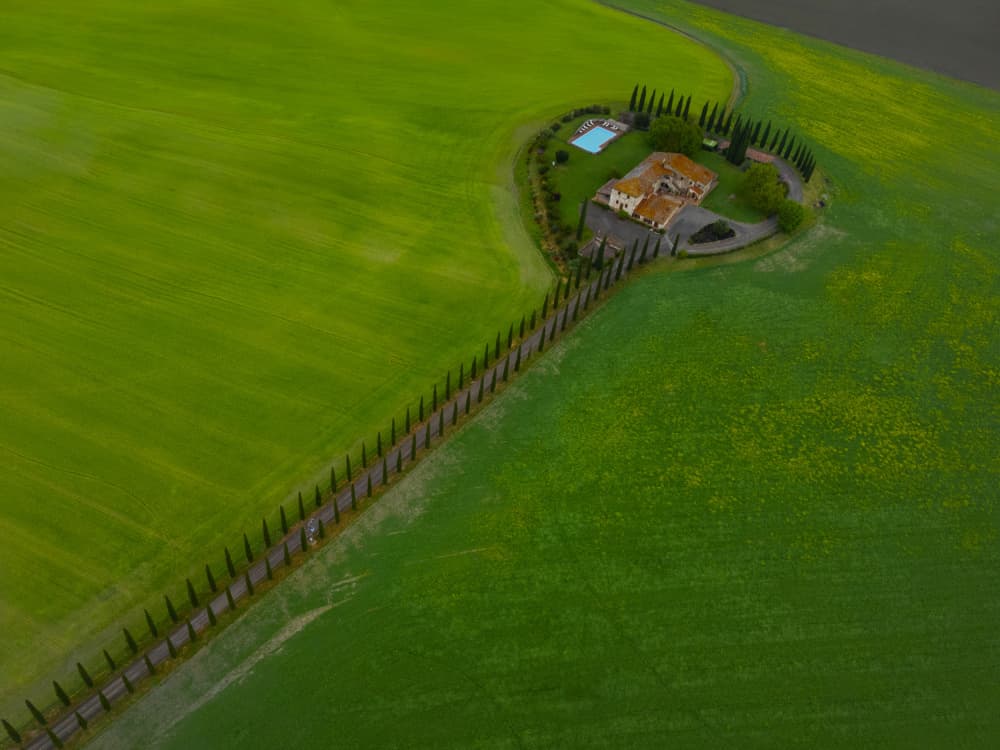 Rolling Green Fields Home by Primož Kožuh — canvas wall art