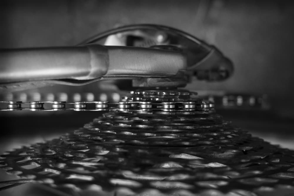Monochrome Bicycle Gears by Christa Stroo — canvas wall art