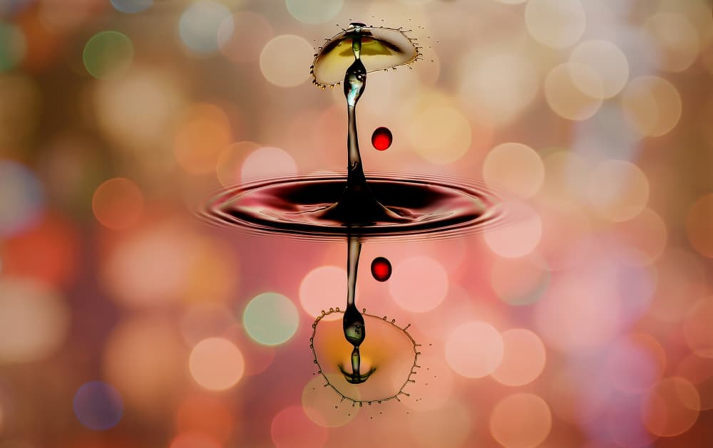 Colorful Drop Reflection by Muhammad Berkati — canvas wall art
