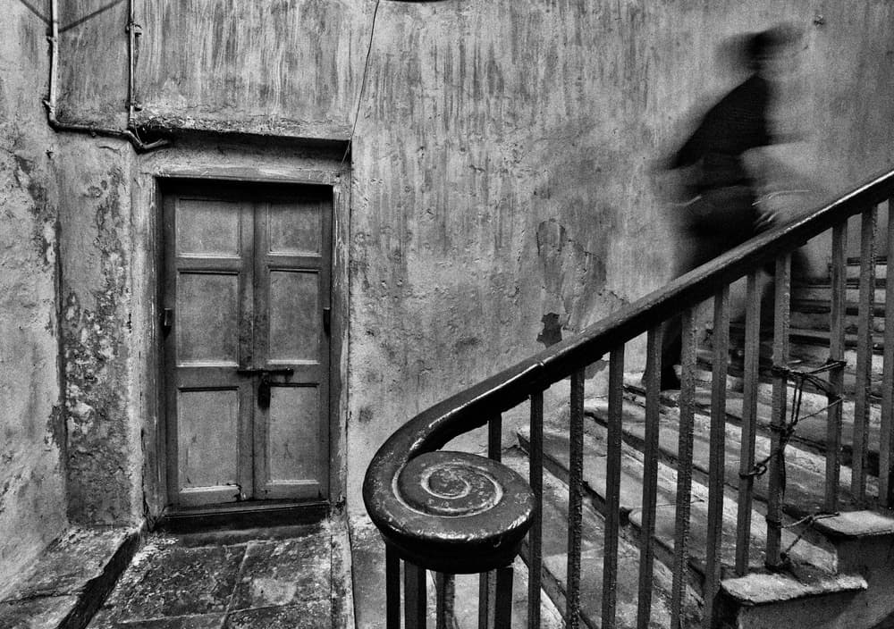 Blurred Figure Old Stairwell by Avishek Das — canvas wall art