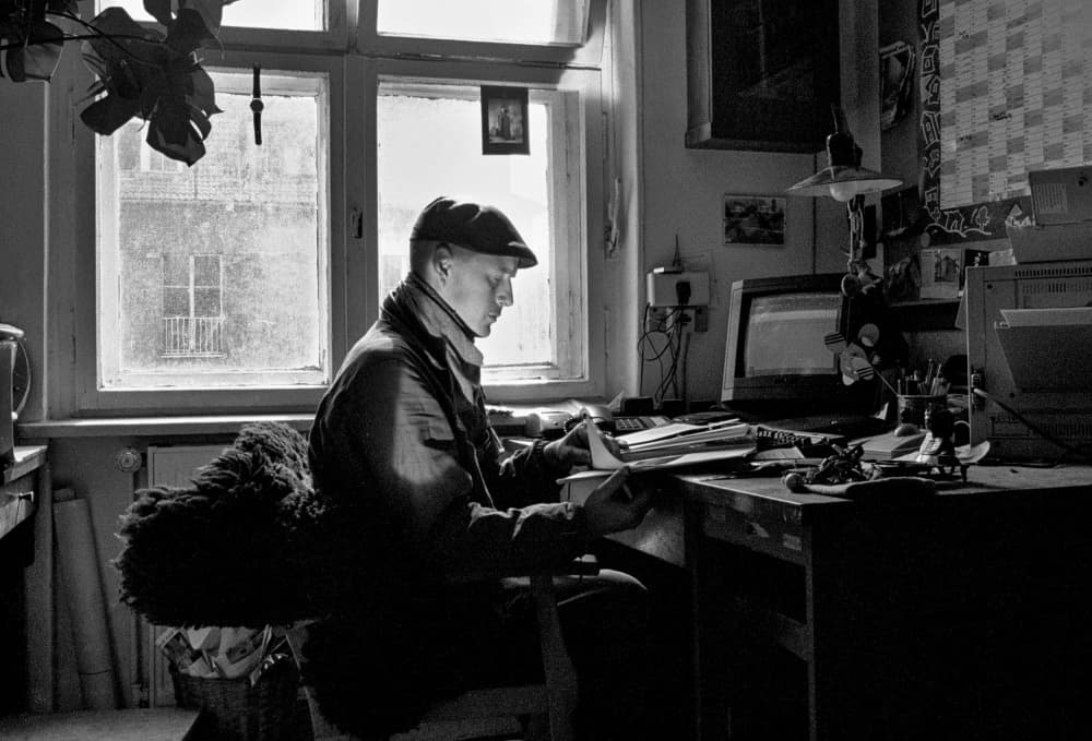 Pensive Man Working by Holger Goehler — canvas wall art