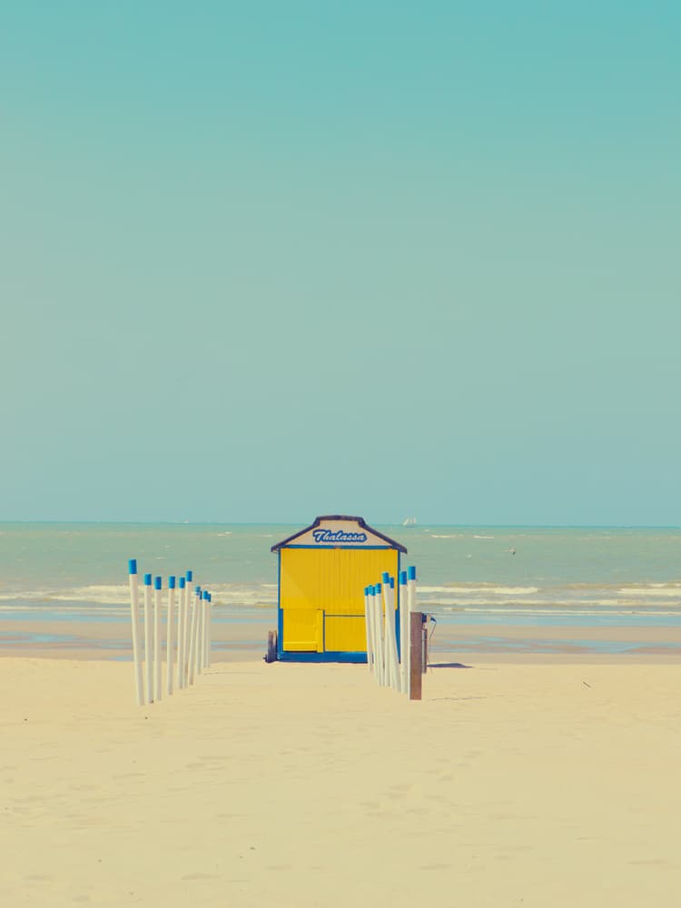 Yellow Beach Hut Serenity by Massimo Della Latta — canvas wall art