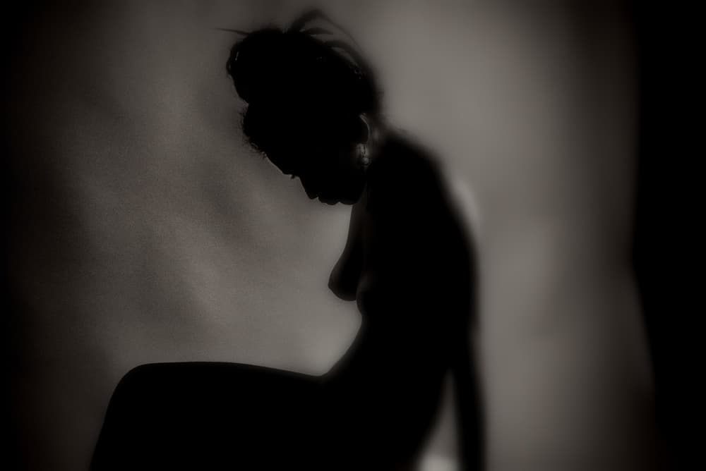 Pensive Woman Silhouette by DAVID MINSTER — canvas wall art