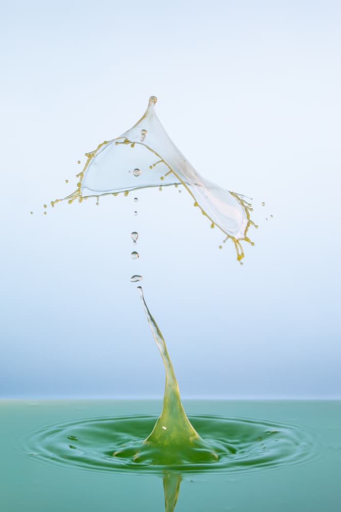 Vibrant Green Water Splash by Franco Tessarolo — canvas wall art