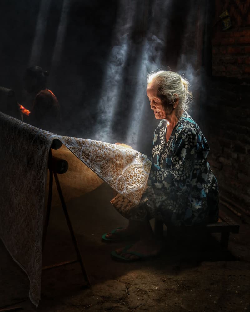 Elderly Artisan's Light by Yohan Tan — canvas wall art