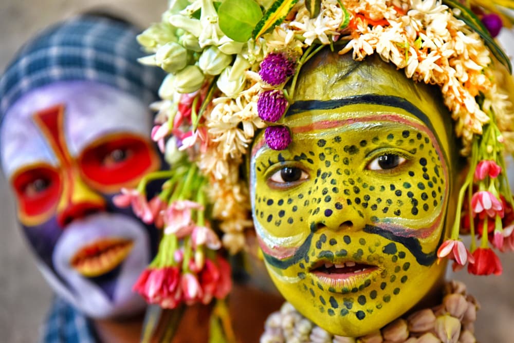 Vibrant Painted Faces by Abhraneel Chakraborty — canvas wall art