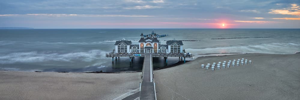 Serene Pier Sunrise by Mari O` Benz — canvas wall art