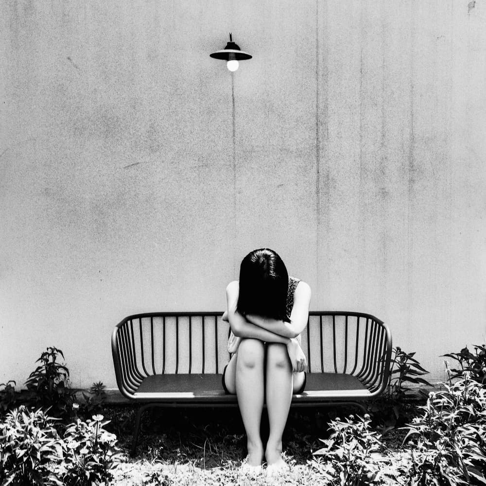 Sad Girl Under Light by Parole Kim — canvas wall art