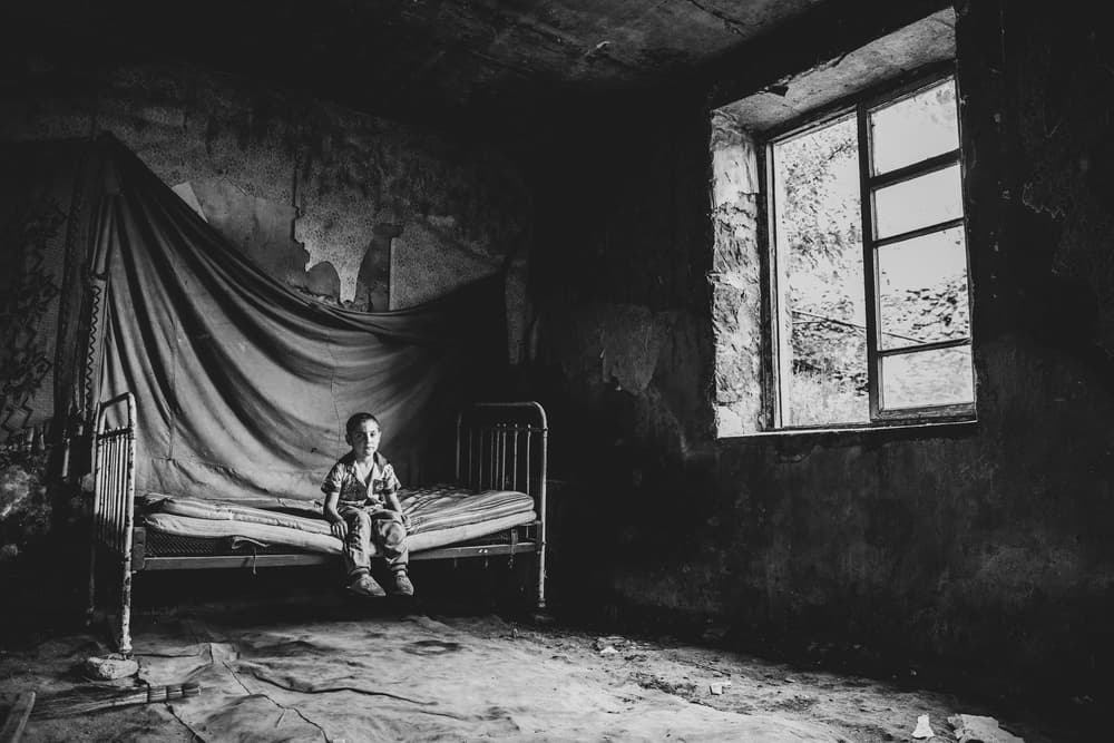 Pensive Boy Window by Patrik Minar — canvas wall art