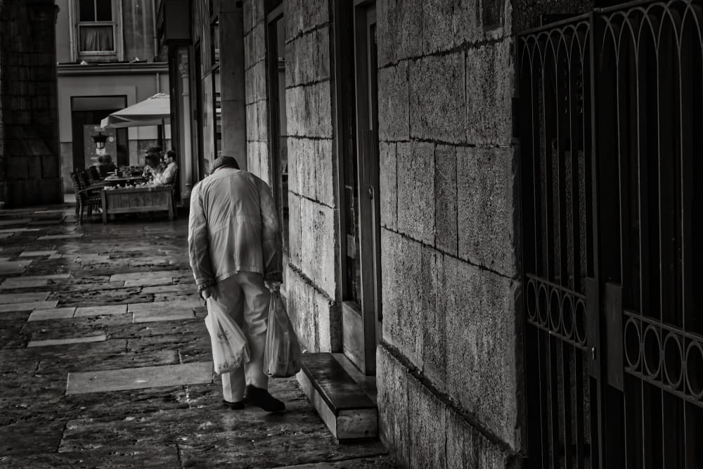 Old Man City Street by Jesus Concepcion Alvarado — canvas wall art