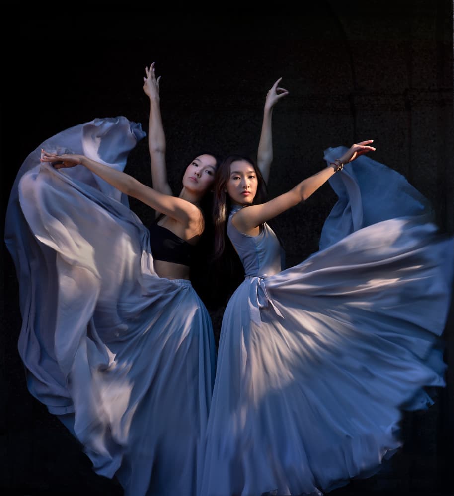 Dancers in Flowing Dresses by Ruiqing P. — canvas wall art