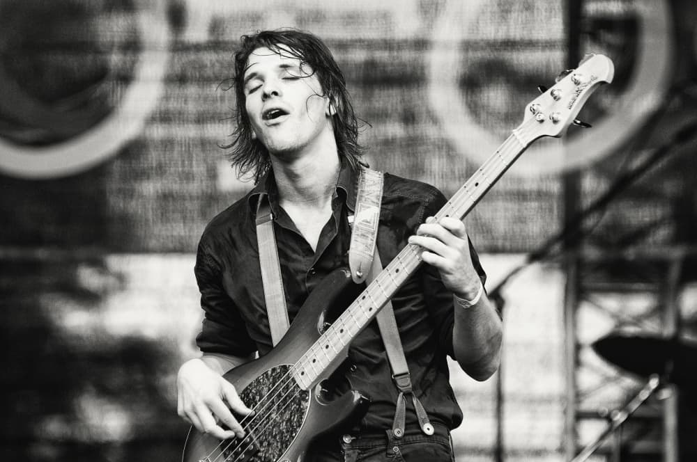 Intense Bass Player by Samir Pajic — canvas wall art