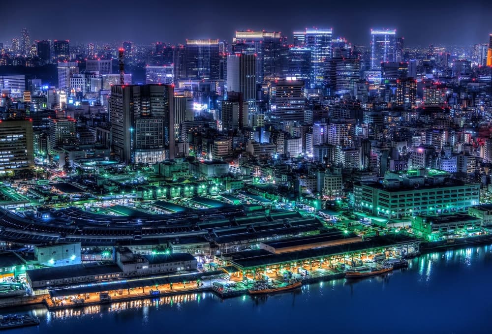Glowing Waterfront Cityscape by Tomoshi Hara — canvas wall art