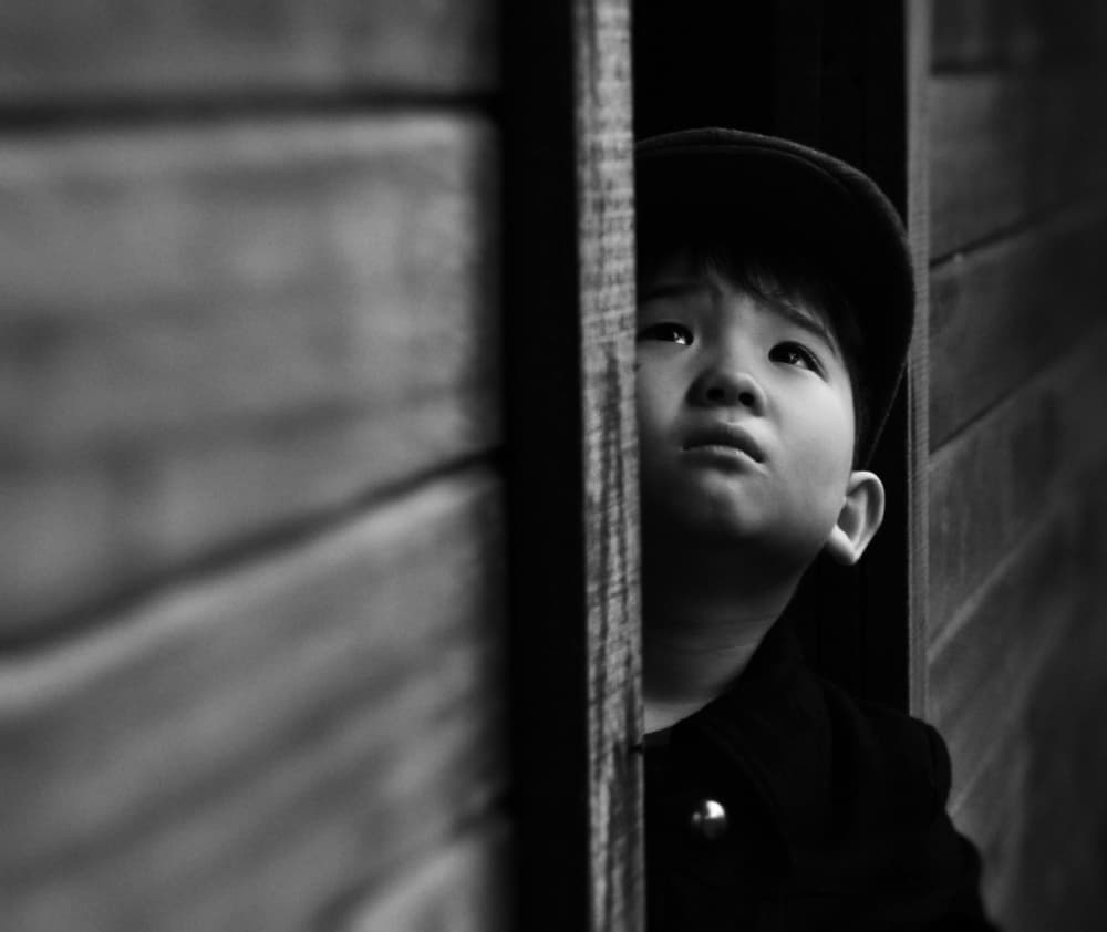 Thoughtful Child Portrait by Ajie Alrasyid — canvas wall art
