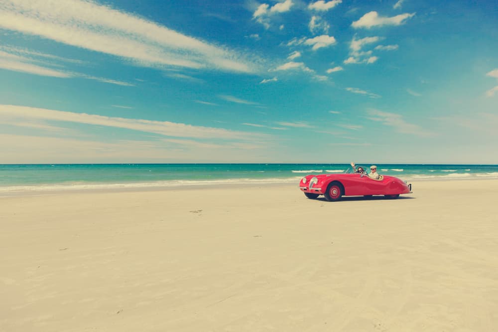 Vintage Car Beach Drive by Massimo Della Latta — canvas wall art