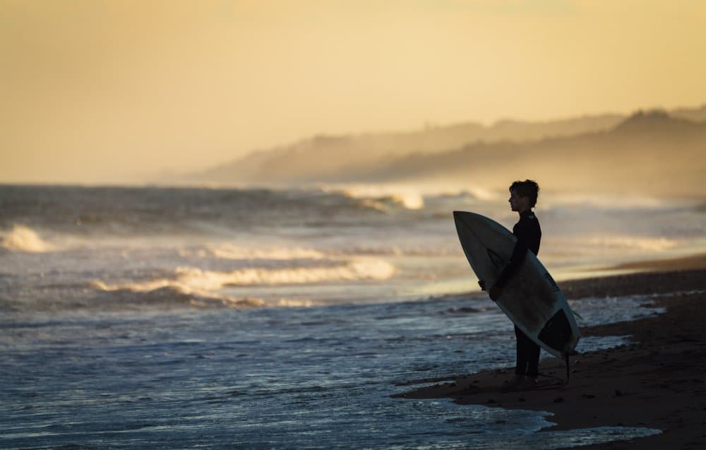 Sunset Surfer Silhouette by William Chen — canvas wall art