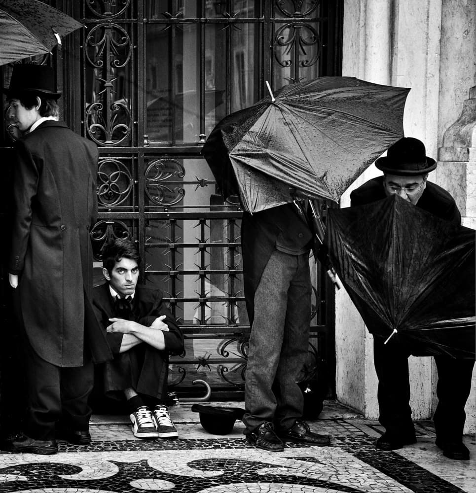 Rainy Street Gentlemen by Mirela Momanu — canvas wall art