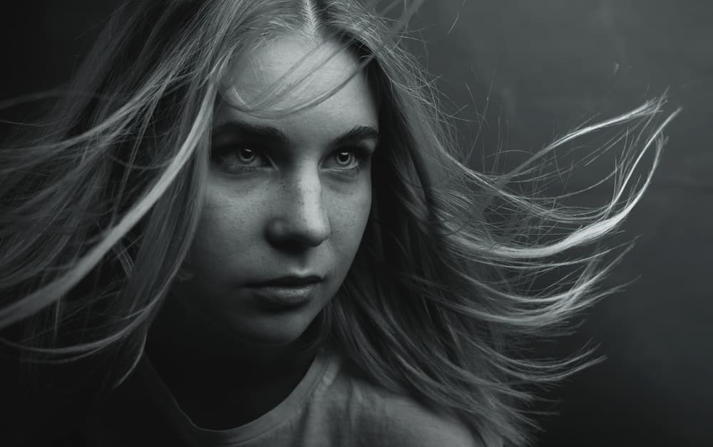 Windblown Blonde Gaze by Yuliya Semenihina — canvas wall art