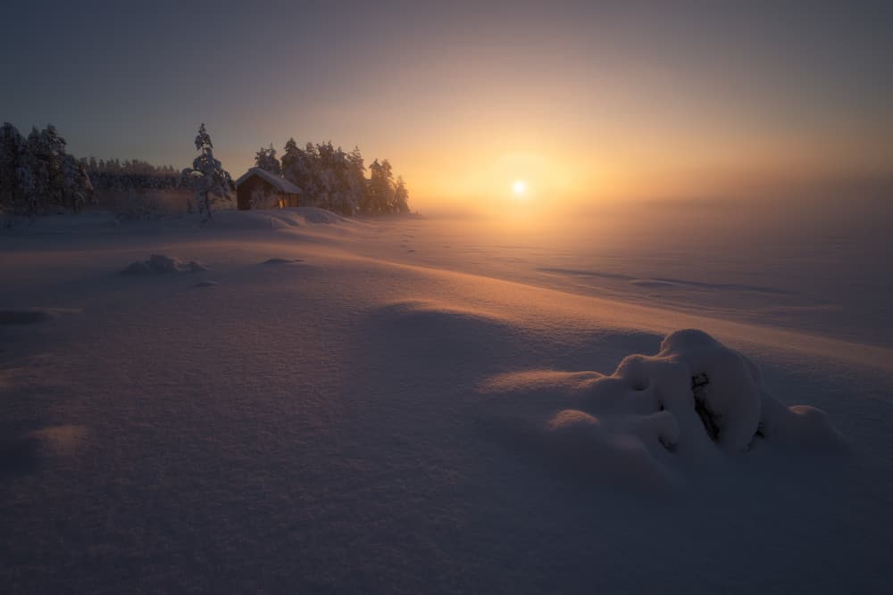 Snowy Cabin Sunrise by Ole Henrik Skjelstad — canvas wall art