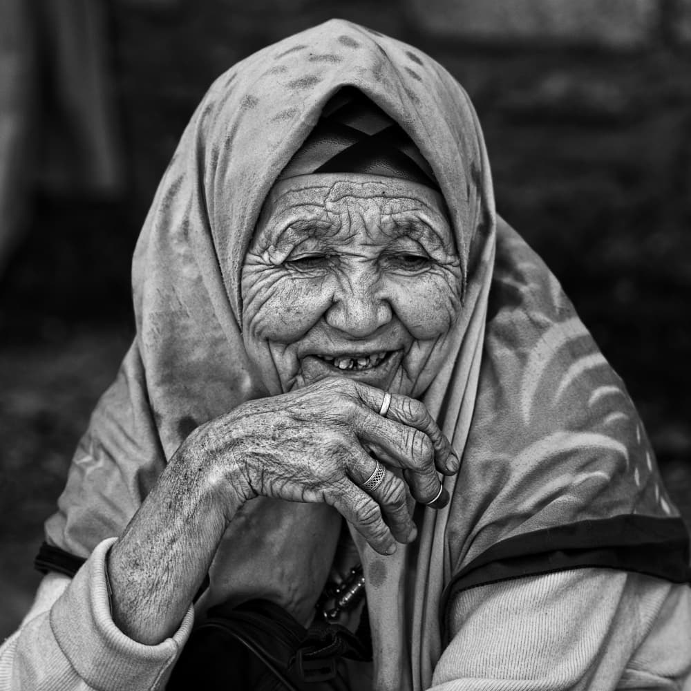 Elderly Woman's Joyful Smile by nebula — canvas wall art
