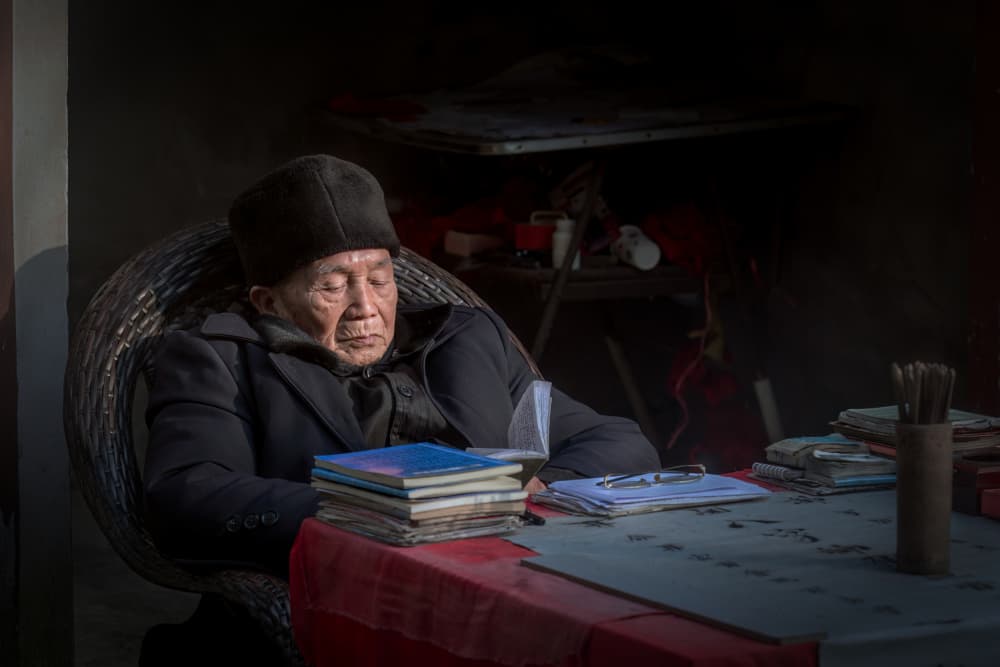 Elderly Chinese Man Resting by Q Liu — canvas wall art