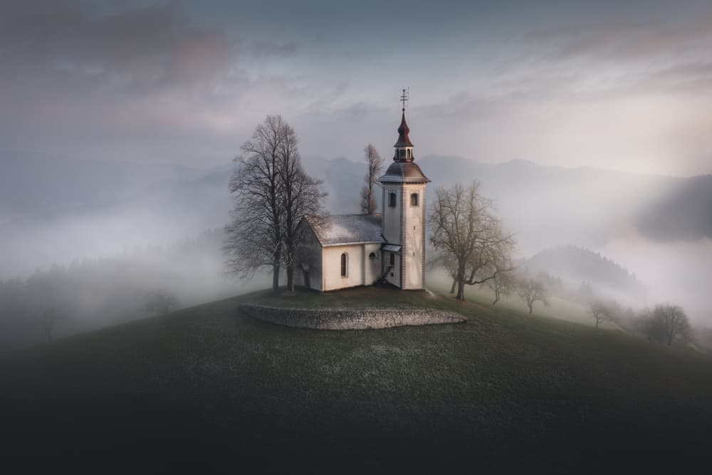 Misty Hilltop Church by Remo Daut — canvas wall art