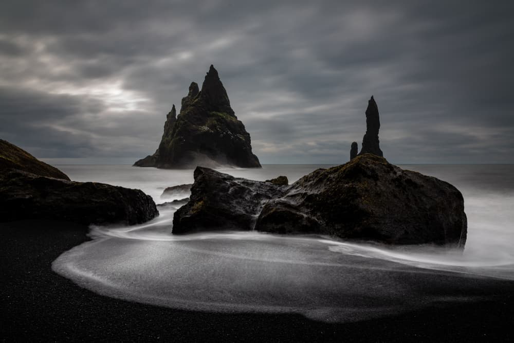 Black Sand Sea Stacks by Franco Farinati — canvas wall art