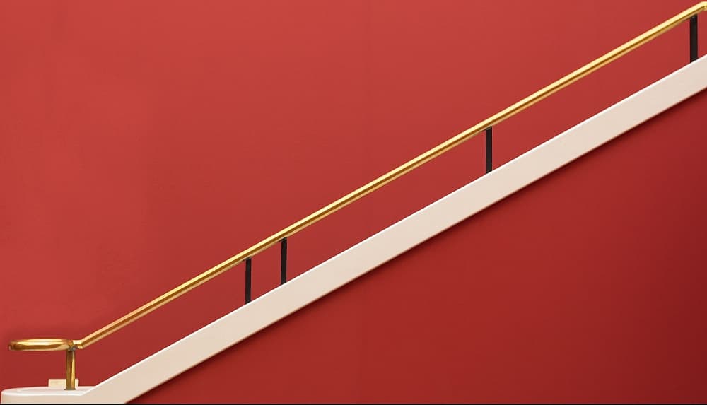 Golden Railing Red Wall by Hans Peter Rank — canvas wall art