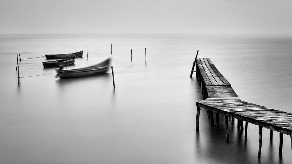 Misty Pier and Boats by Anghel Rusu — canvas wall art