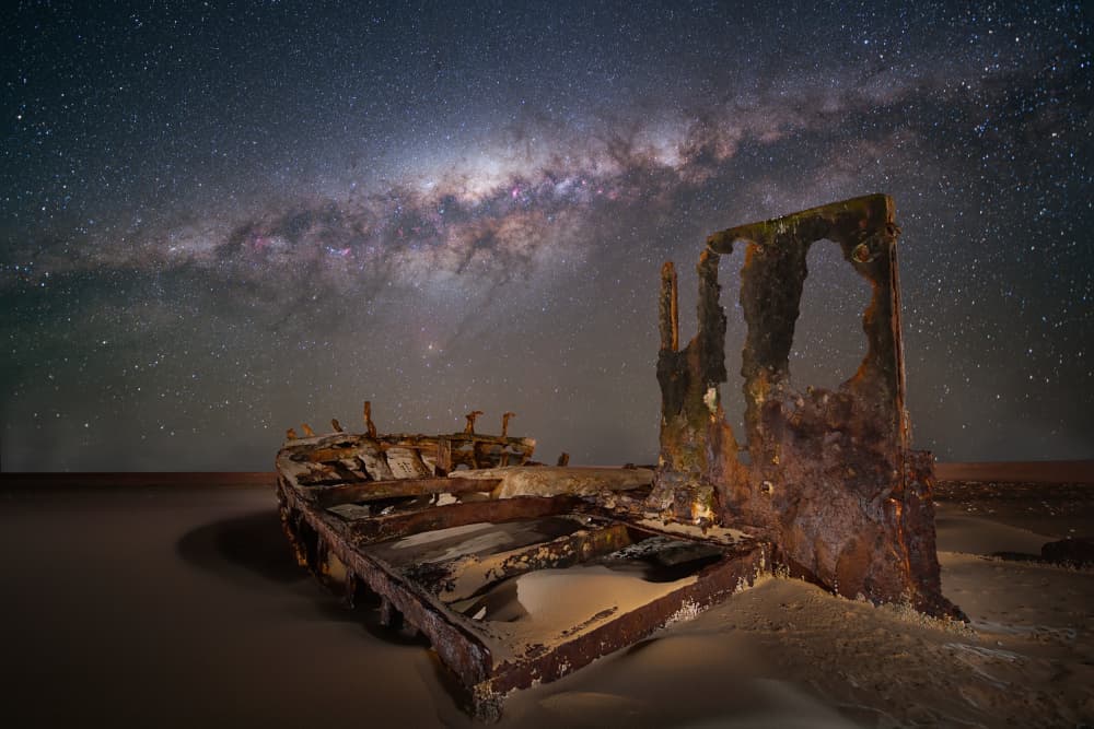 Shipwreck Under Milky Way by Vikas Chander — canvas wall art