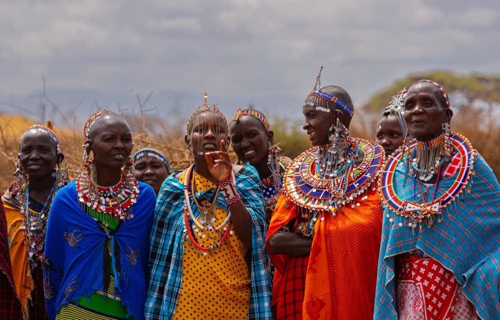 Vibrant Maasai Women by Johnson Huang — canvas wall art