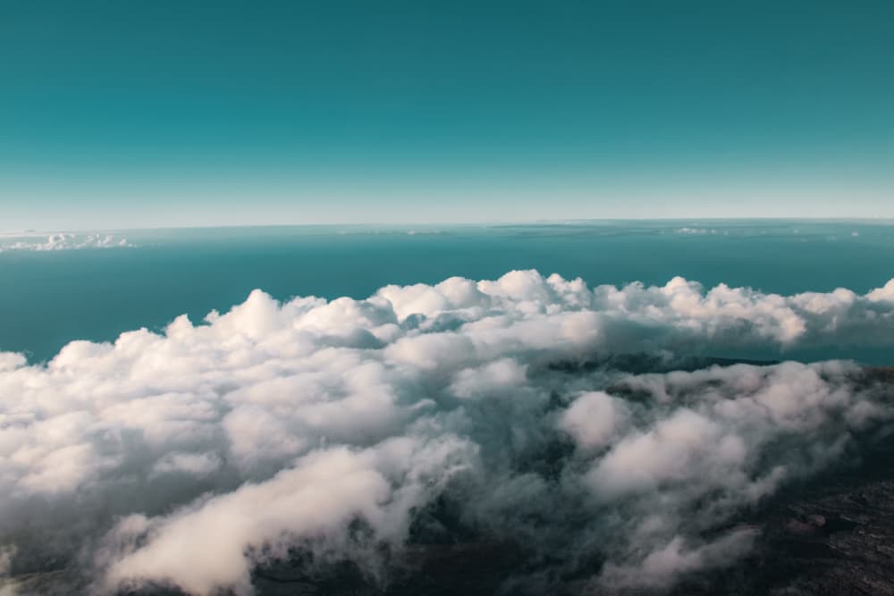 Above Ocean Clouds by Léa Lefebvre — canvas wall art