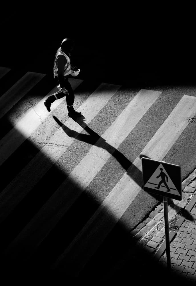 Man On Crosswalk Shadow by Anna Niemiec — canvas wall art