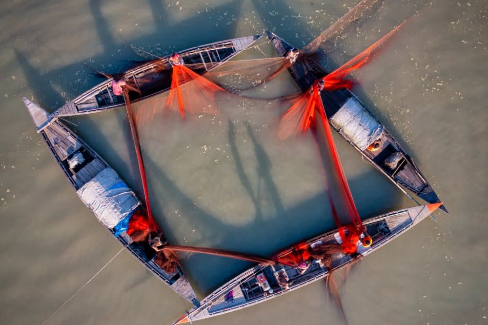 Red Nets Fishing Formation by Azim Khan Ronnie — canvas wall art