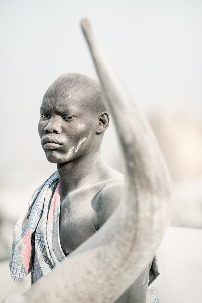 African Man With Horn by Trevor Cole — canvas wall art