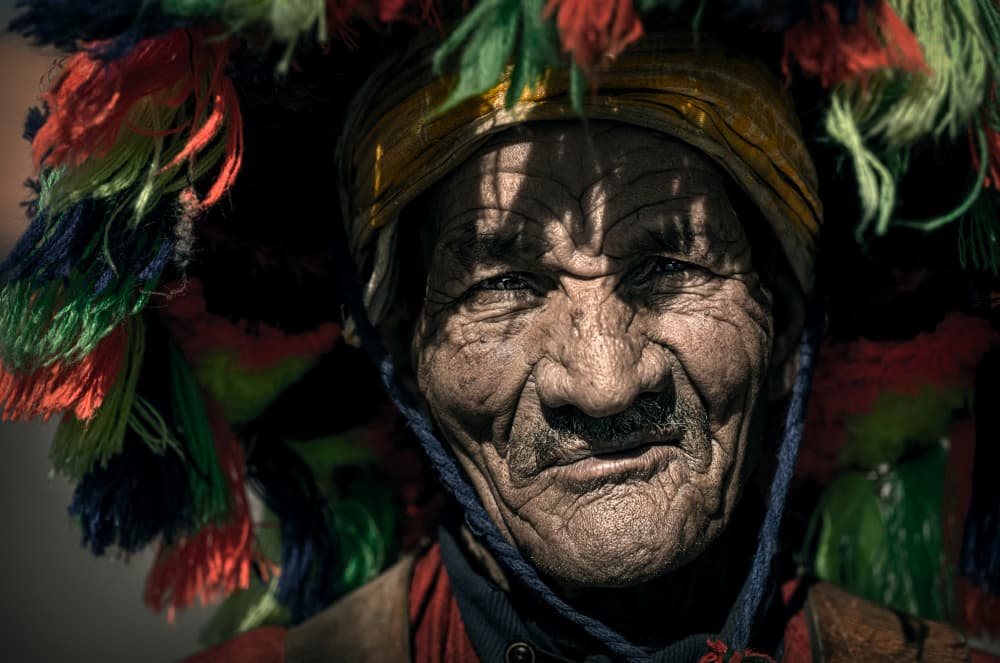 Man with Colorful Headdress by Waldemar Szmidt — canvas wall art