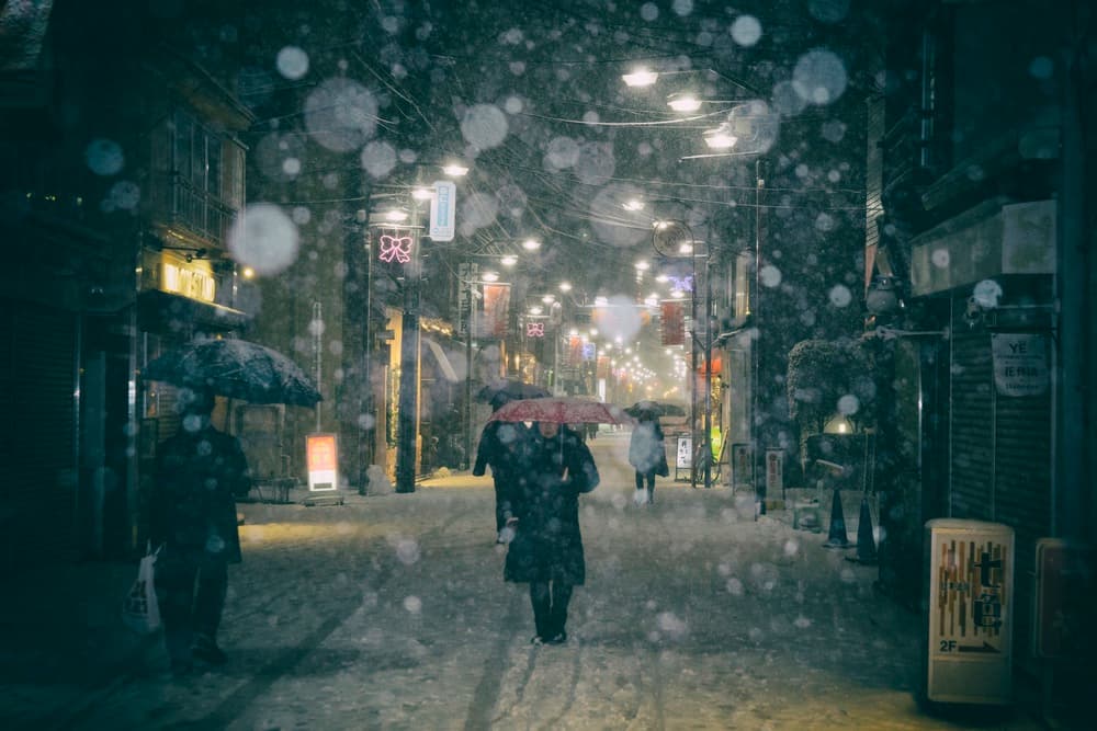 Snowy City Night Umbrellas by 7 Flavor C/P — canvas wall art