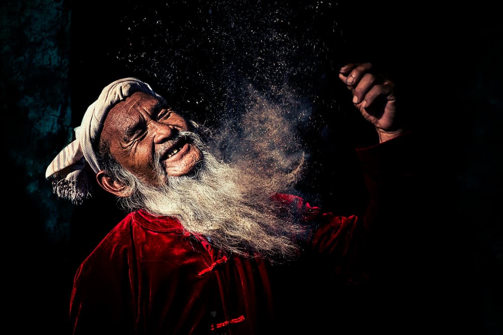 Joyful Man with Powder by Burak Senbak — canvas wall art