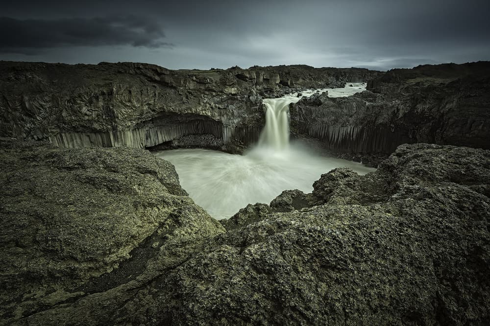 Moody Basalt Waterfall by Raymond Hoffmann — canvas wall art