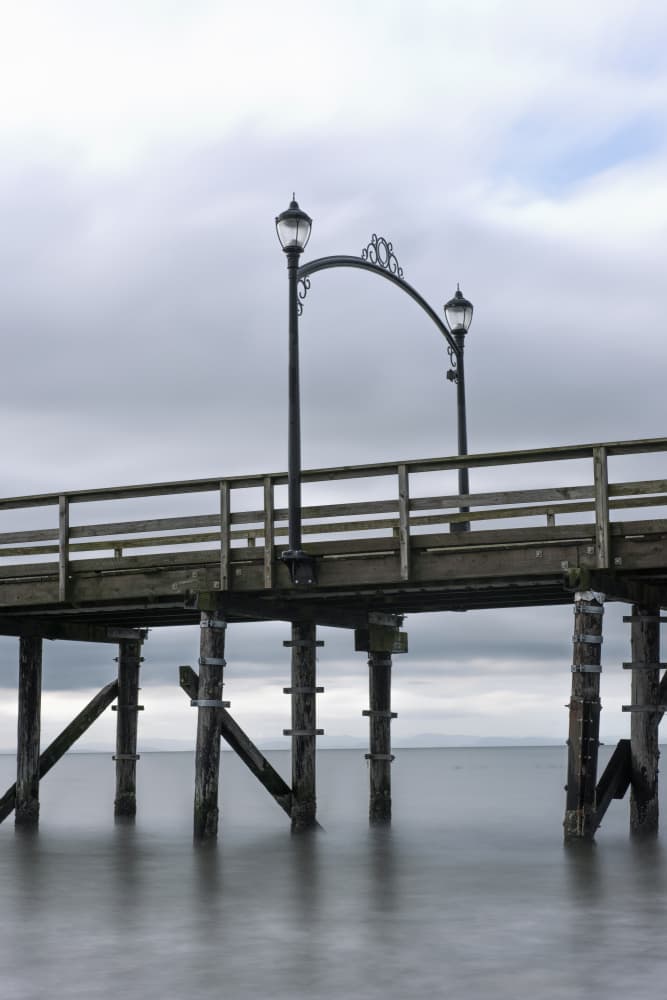 Tranquil Ocean Pier by Lynann Colligan — canvas wall art