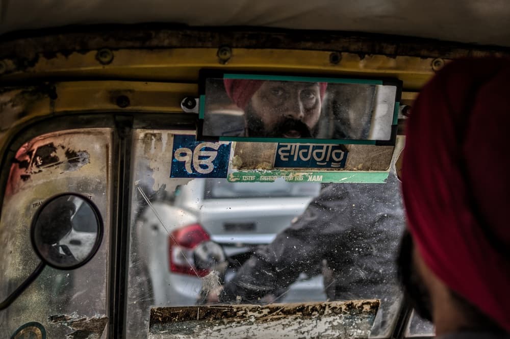 Rickshaw Driver Reflection by Pavol Stranak — canvas wall art