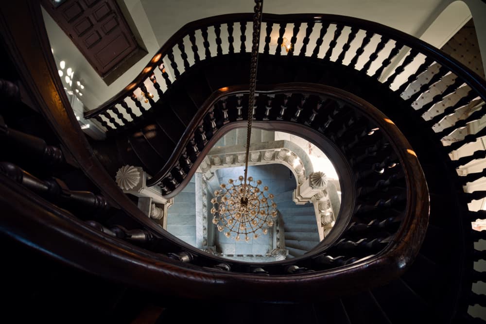 Ornate Spiral Staircase Chandelier by Alaa Nour — canvas wall art