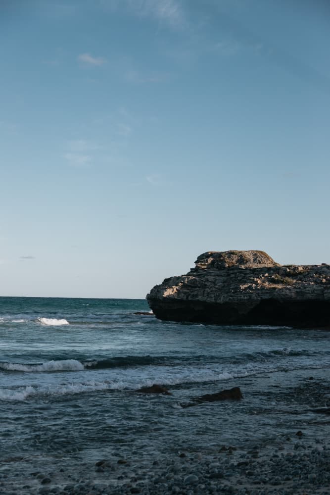 Ocean Waves and Rock by Megan Shone — canvas wall art