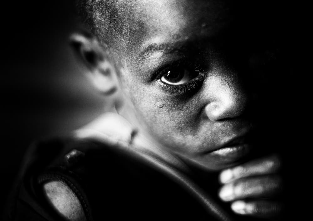 Pensive Boy's Gaze by Goran Jovic — canvas wall art