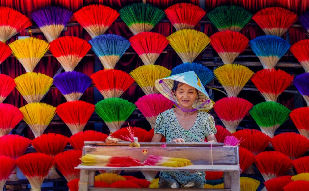 Colorful Incense Artisan by Nguyen Tan Tuan — canvas wall art